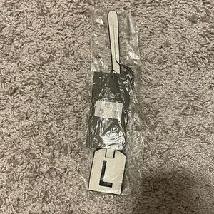 NWT “K•Carroll” Bag Tag Monogram Letter “L” White Bag Tag with “Black” Letter